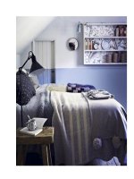 Trang trí nội thất phòng ngủ với màu xanh nổi bật và sang trọng doc