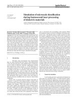 simulation of microscale densification during femtosecond laser processing of dielectric materials