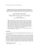 Buckling analysis of eccentrically stiffened functionally graded circular cylindrical thin shells under mechanical load