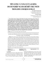 Tiền lương và năng suất lao động doanh nghiệp ngành chế biến thực phẩm trong bối cảnh dịch Covid-19.pdf
